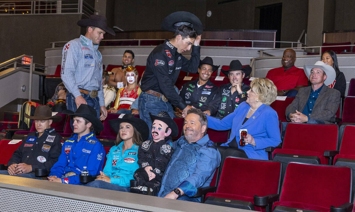 Jess Pope, PRCA World Champion Bareback Rider 2022, tips his hat while greeting Mayor Carolyn G ...
