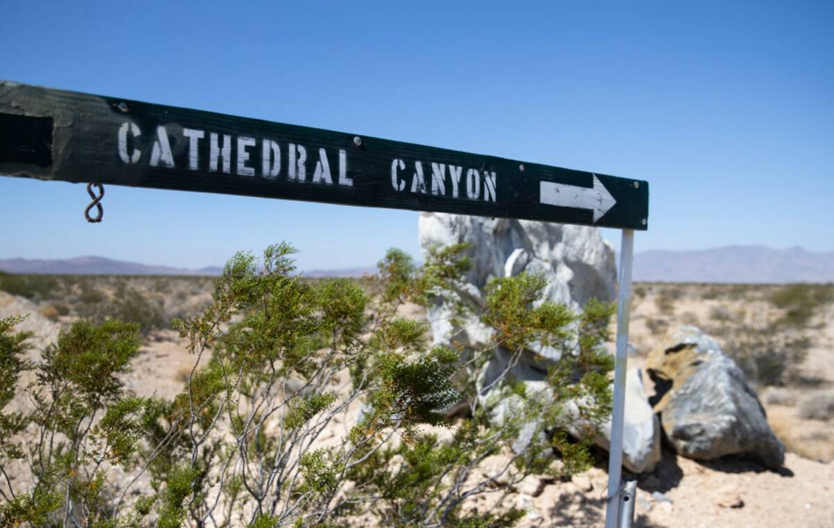 The sign pointing to Cathedral Canyon is shown near a cliff in August 2021. (Bizuayehu Tesfaye/ ...