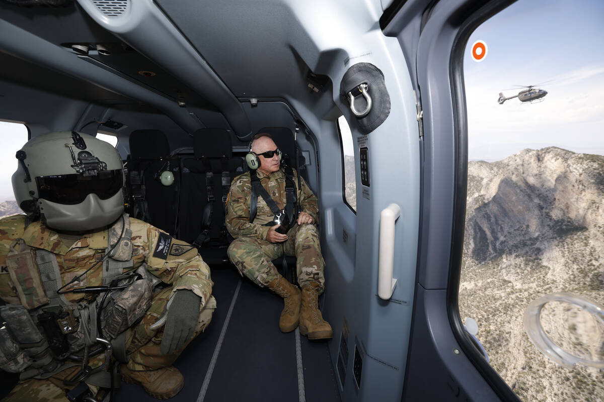 U.S. Army National Guard Sgt. Michael Knight, left, and Sgt. 1st Class Erick Studenicka, ride a ...