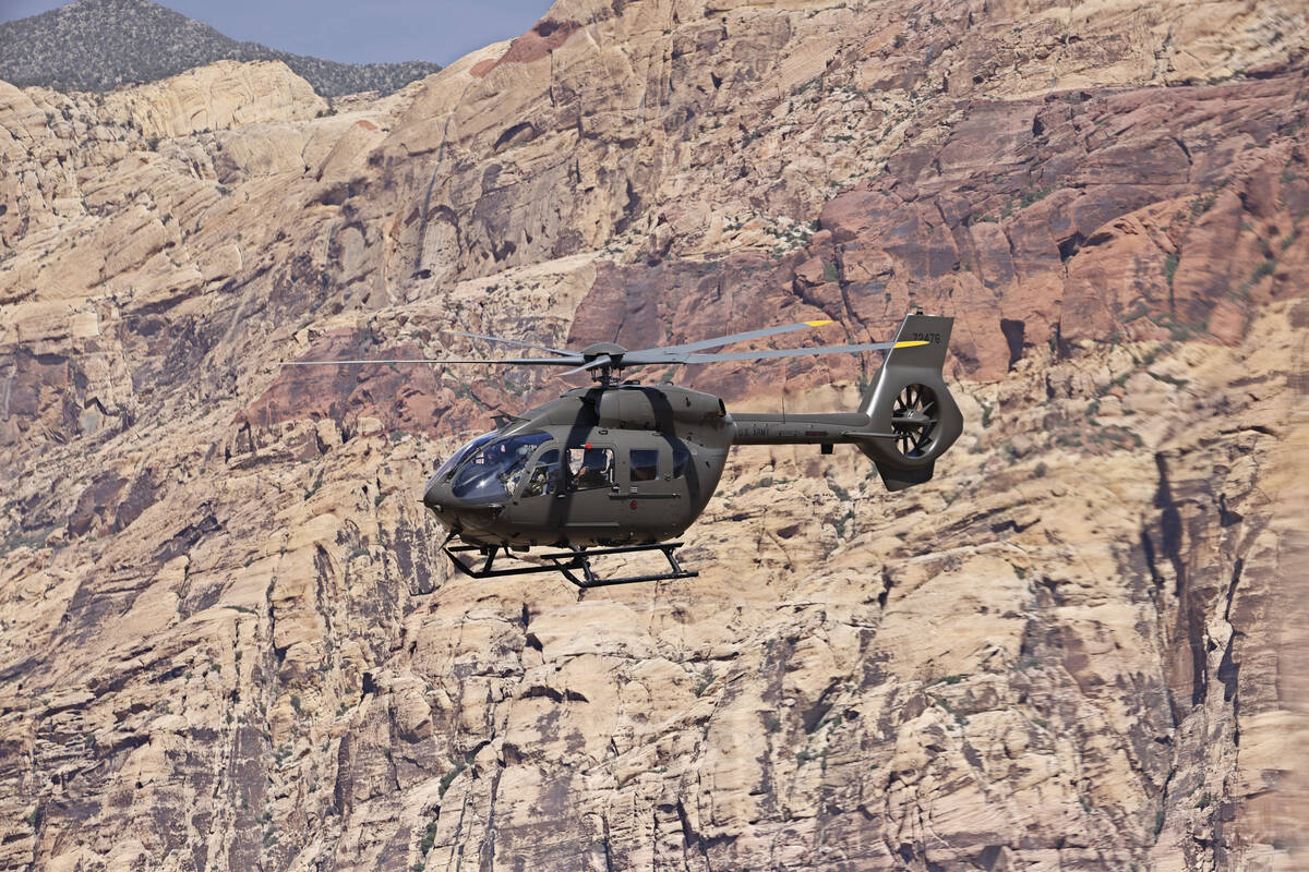 A UH-72B Lakota helicopter that belongs to the Nevada Army Guard flies over Red Rock Canyon on ...