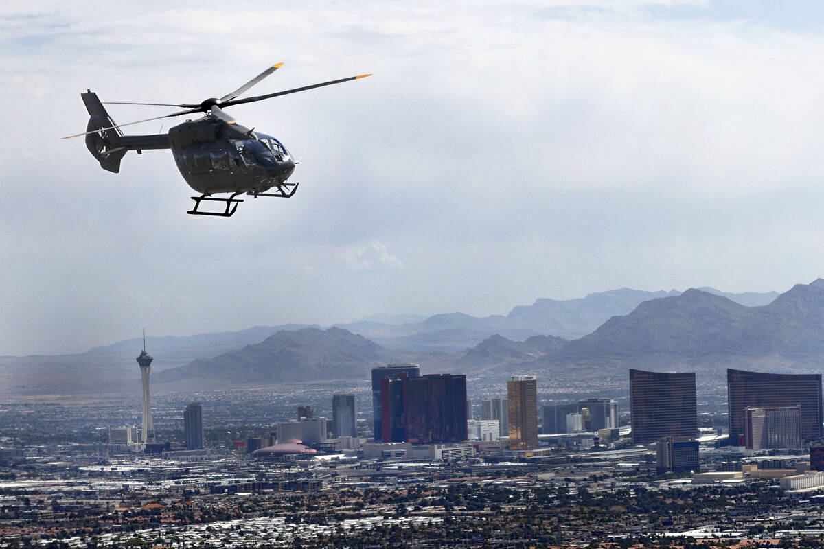 A UH-72B Lakota helicopter that belongs to the Nevada Army Guard flies over the Las Vegas Strip ...