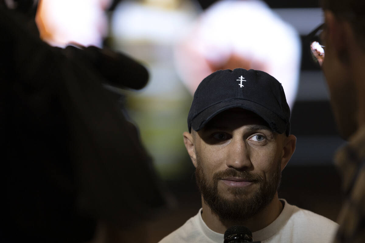 Vasily Lomachenko speaks to the press after arriving to MGM Grand ahead of his Saturday night u ...