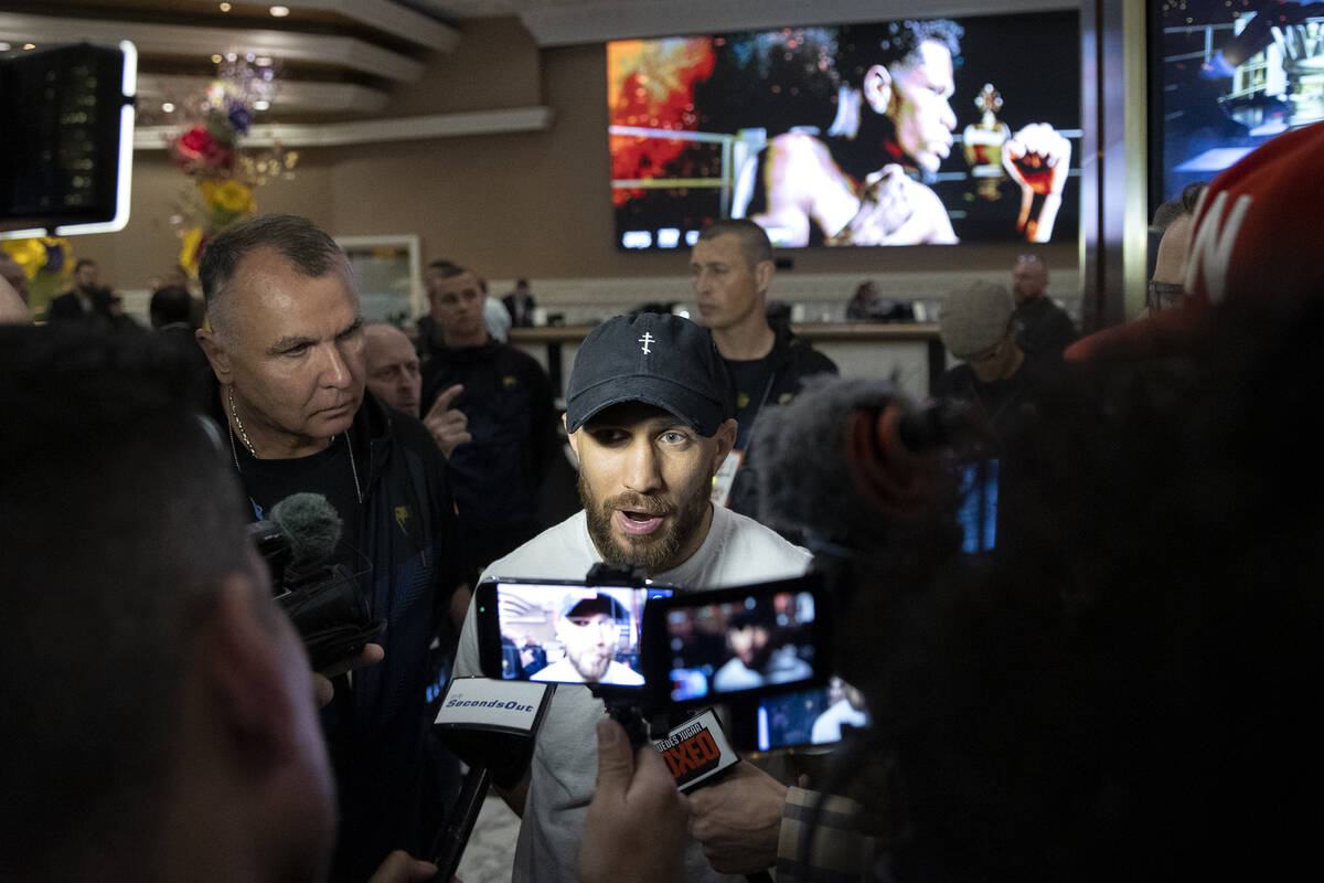 Vasily Lomachenko speaks to the press after arriving to MGM Grand ahead of his Saturday night u ...