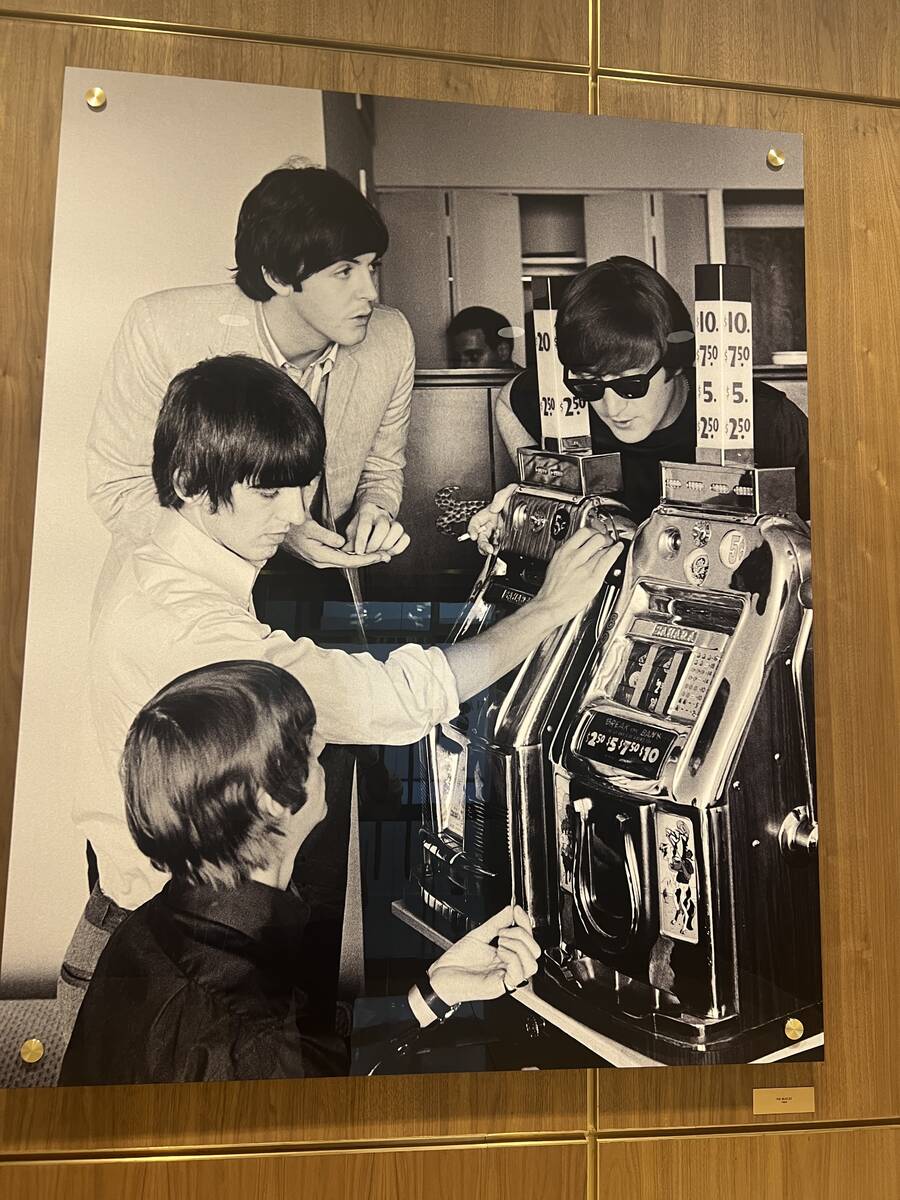 A photo of the Beatles playing a slot machine in 1964 is shown at the Sahara on Saturday, Oct. ...