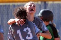 Centennial players, including pitcher Teagan Clemmons, right, and Keana Bell (13) celebrate bea ...