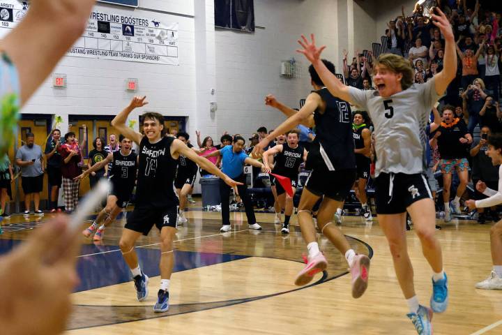 Shadow Ridge’s players celebrate their victory against Palo Verde after the Class 5A boy ...