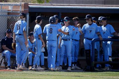 Foothill's Andrew Durham (8) celebrates with his teammates after scoring on a single by Foothil ...