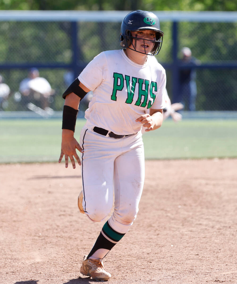 Palo Verde High's Belle Will runs the base after hitting a triple against Douglas High during C ...