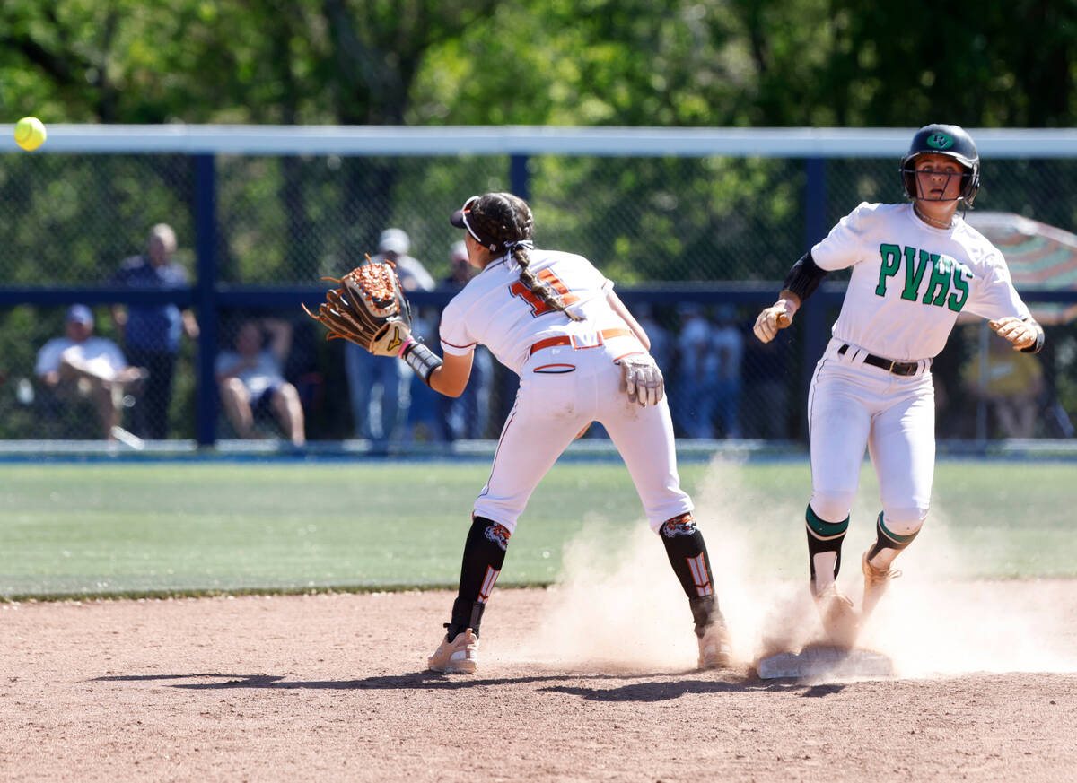 Palo Verde High's second baseman Taylor Johns, right, slides safe to second as Douglas High's Z ...