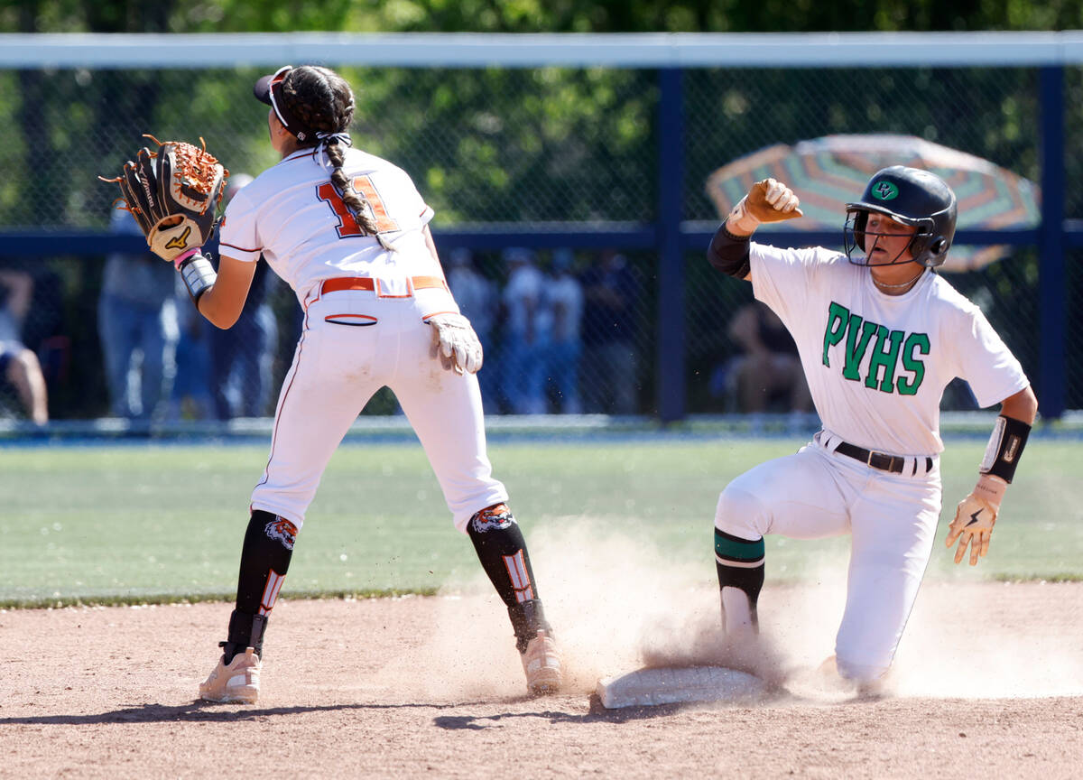 Palo Verde High's second baseman Taylor Johns, right, slides safe to second as Douglas High's Z ...