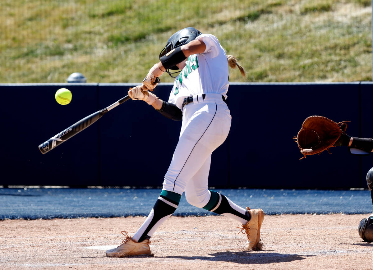 Palo Verde High's second baseman Taylor Johns connects during Class 5A softball state tournamen ...