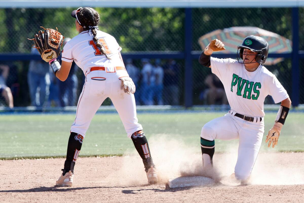 Palo Verde High's second baseman Taylor Johns, right, slides safe to second as Douglas High's Z ...