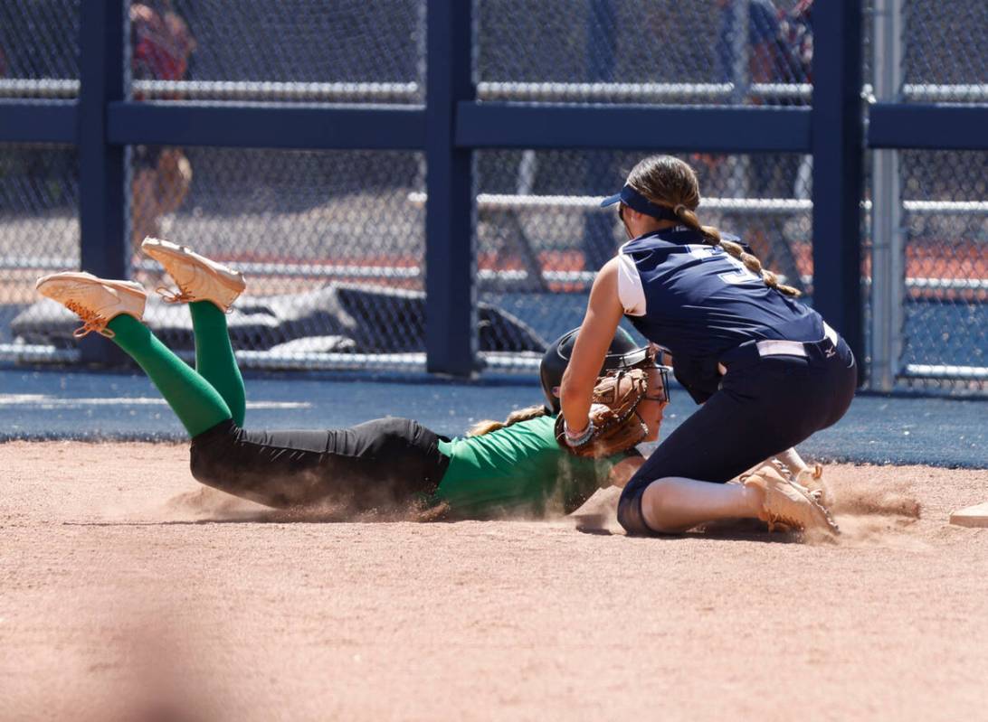 Centennial High's first baseman Carmella Korte tags a sliding Palo Verde High's Taylor Johns as ...