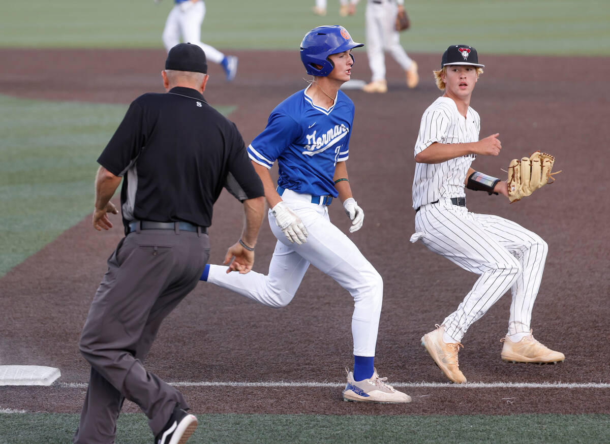 Desert Oasis High's pitcher Seth Graham-Pippin forces out Bishop Gorman's Nolan Eberwein at fir ...