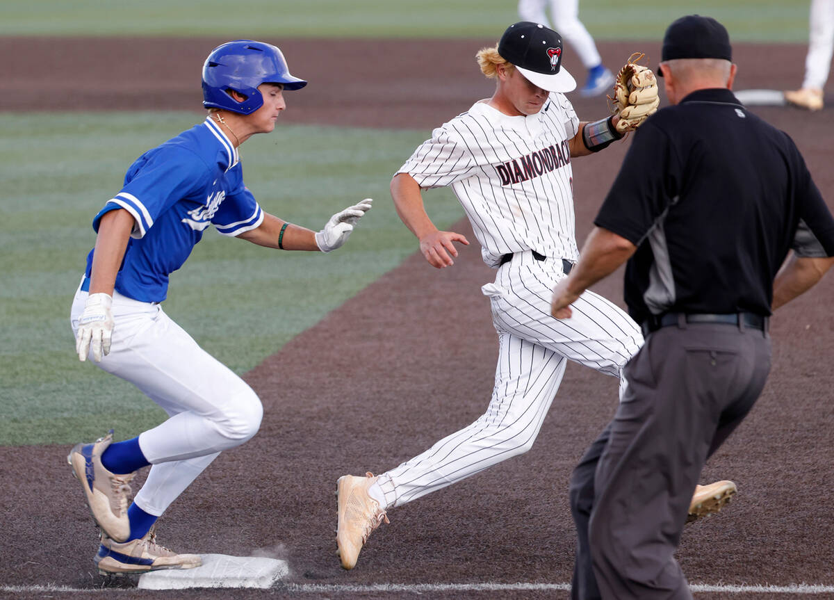 Desert Oasis High's pitcher Seth Graham-Pippin forces out Bishop Gorman's Nolan Eberwein at fir ...