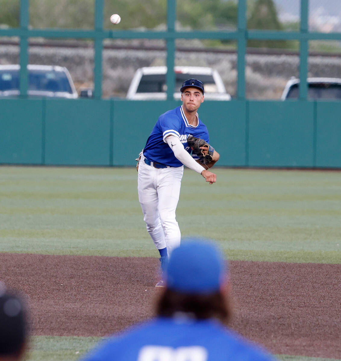 Bisho Gorman High shortstop Maddox Riske throws to first for an out against Desert Oasis High d ...