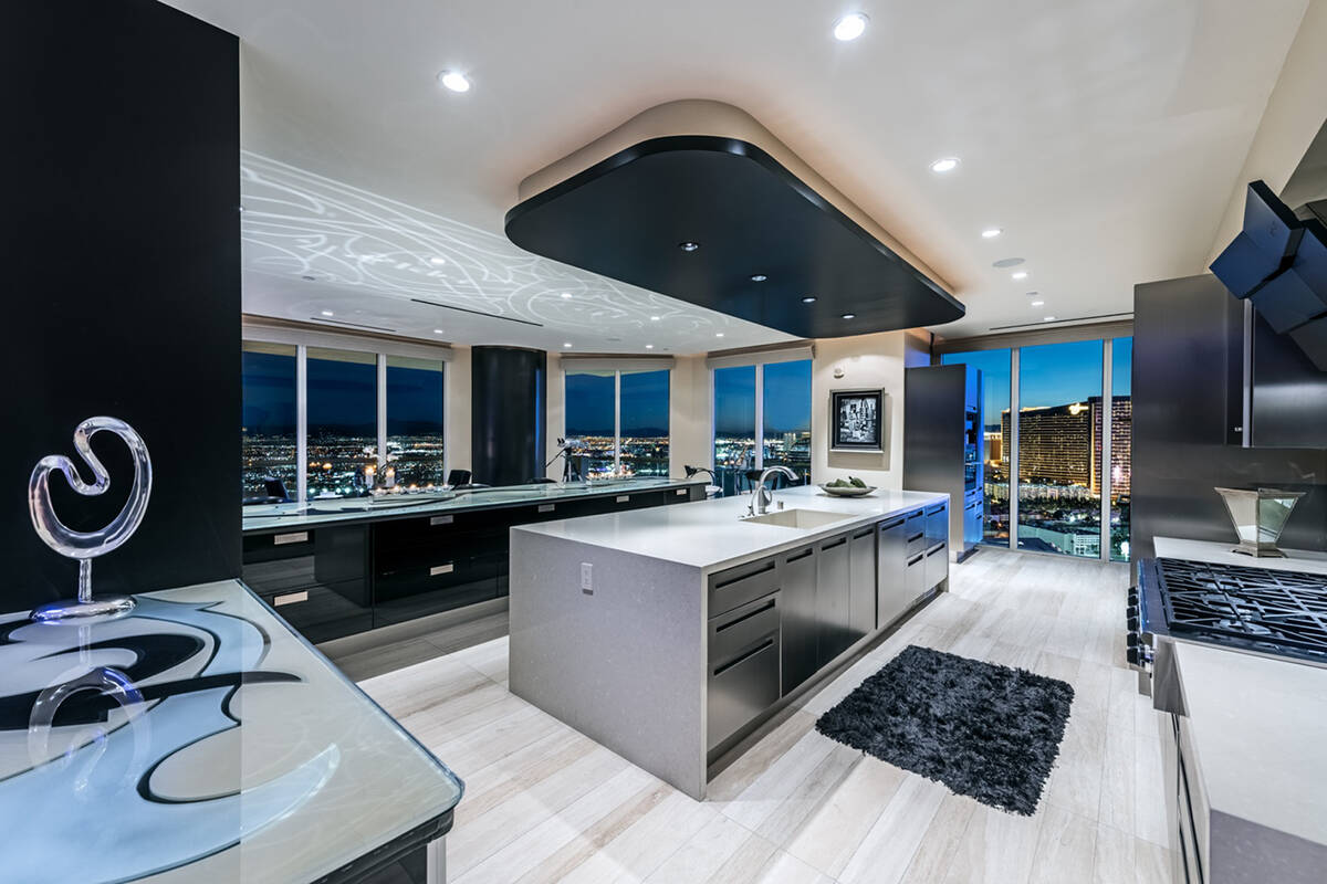 The two-story Turnberry Place penthouse on the 37th and 38th floor measures 6,401 square feet a ...