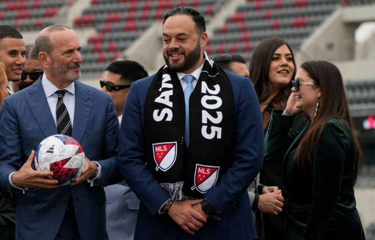 MLS Commissioner Don Garber, left, stands with Sycuan Tribe Chairman Cody Martinez, center with ...
