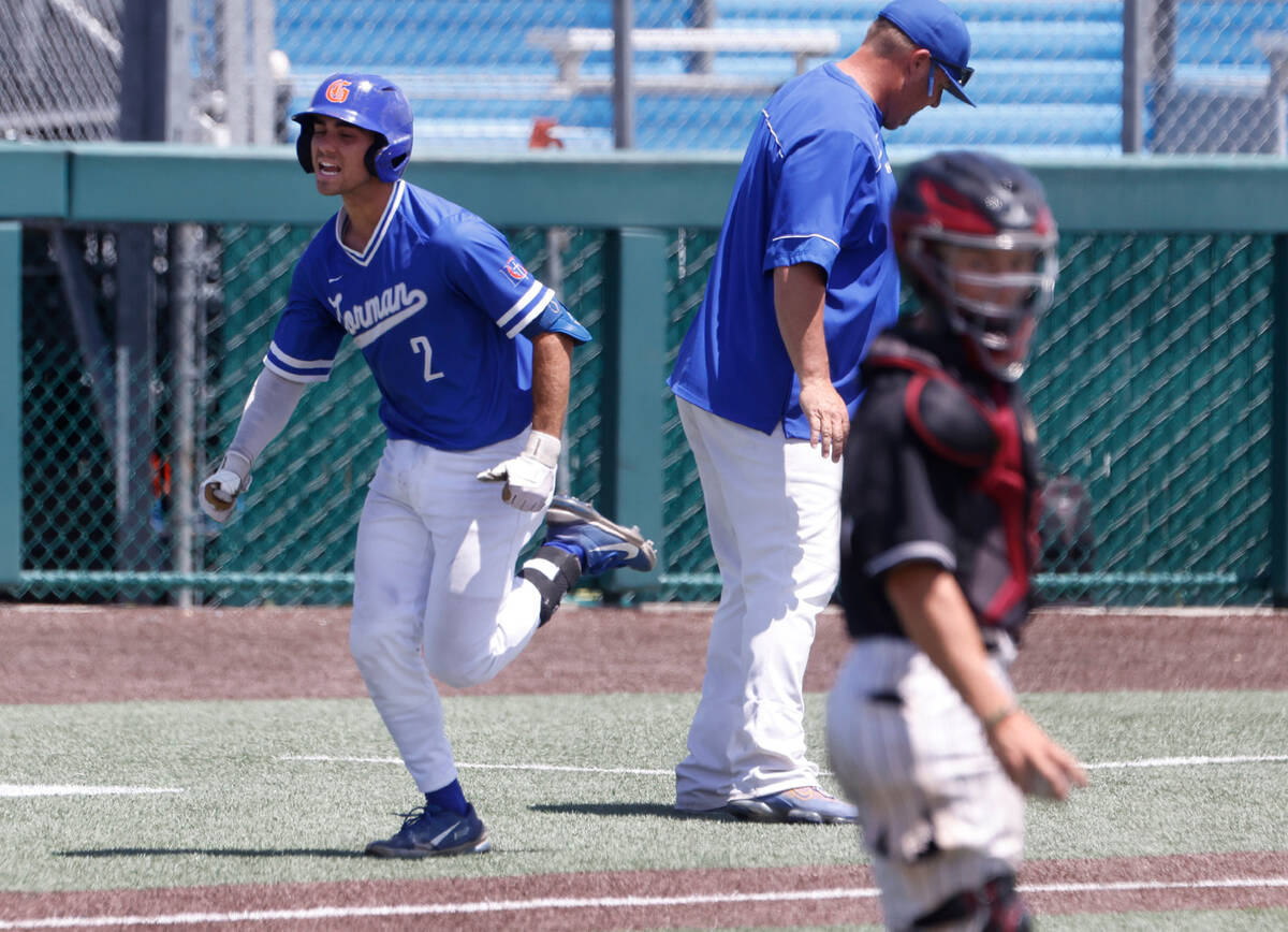 Bishop Gorman's Maddox Riske reacts as he runs the bases after hitting a grand slam against Des ...