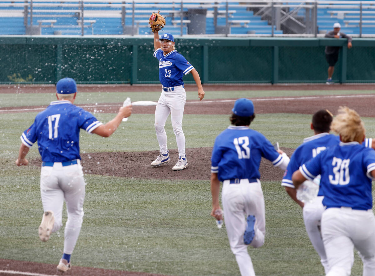 Bishop Gorman's Aiden Pollock (23) celebrates with his teammates after beating Desert Oasis in ...