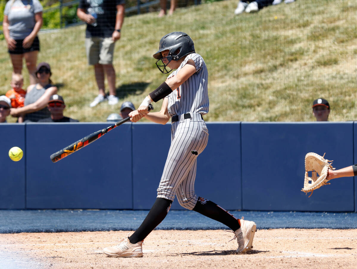 Douglas' Cam McLelland connects for a hit against Centennial during a Class 5A state softball g ...