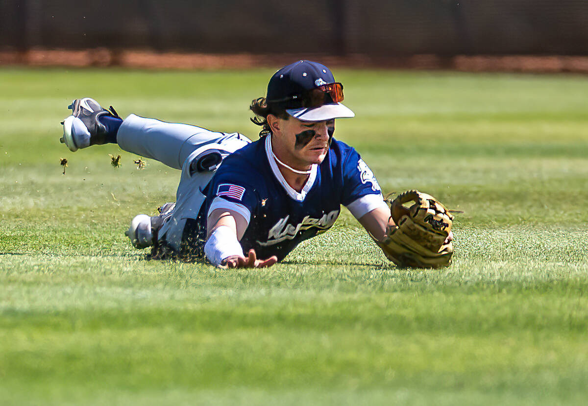 Shadow Ridge OF Ty Silva makes a diving catch against Foothill during the first inning of a NIA ...