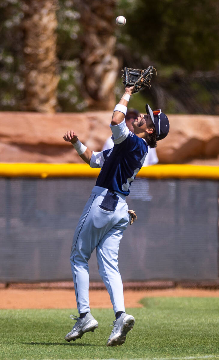 Shadow Ridge SS Michael Brown eyes a pop fly against a Foothill batter during the second inning ...