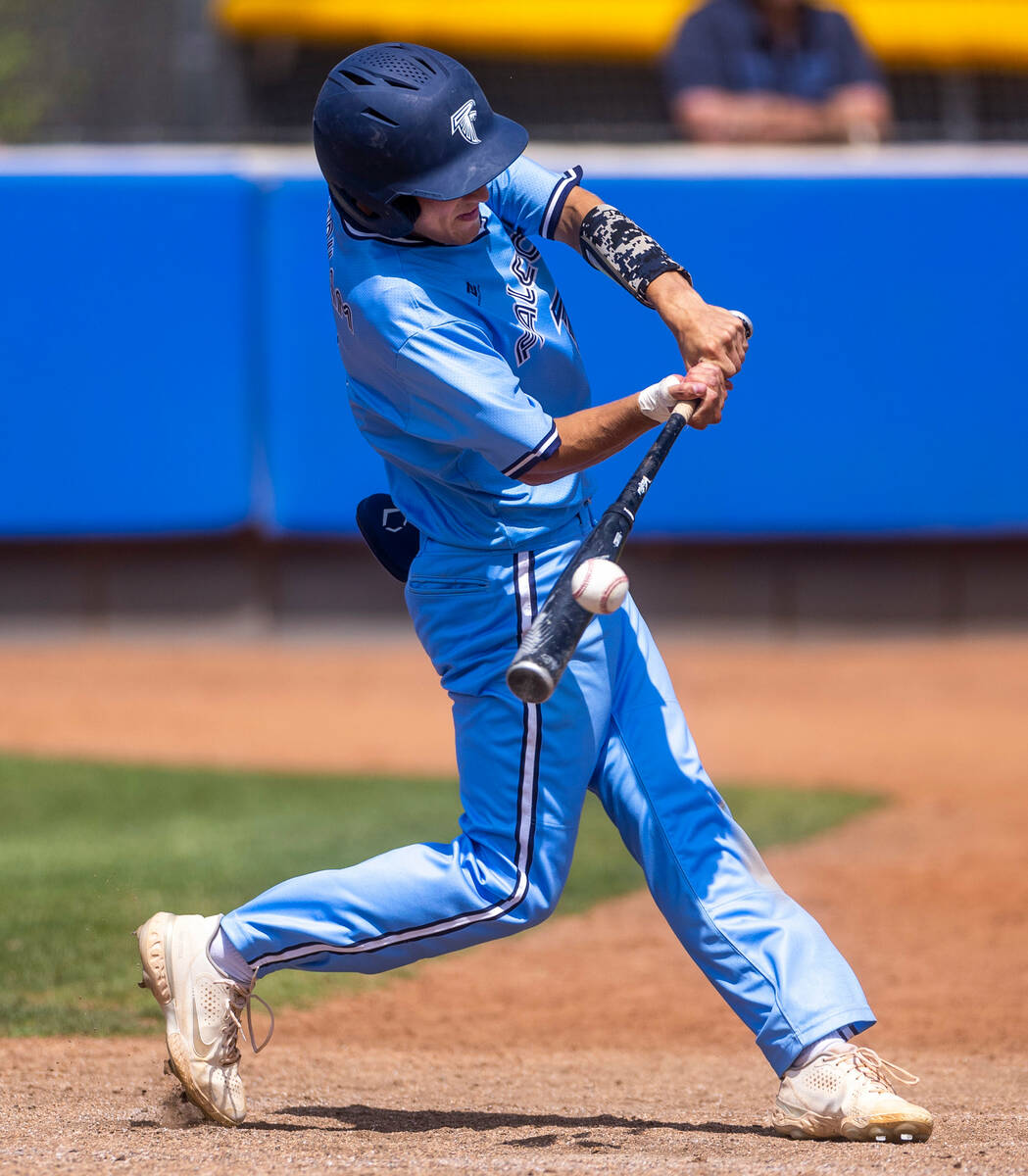 Foothill batter Andrew Durham connects on a double against Shadow Ridge during the third inning ...