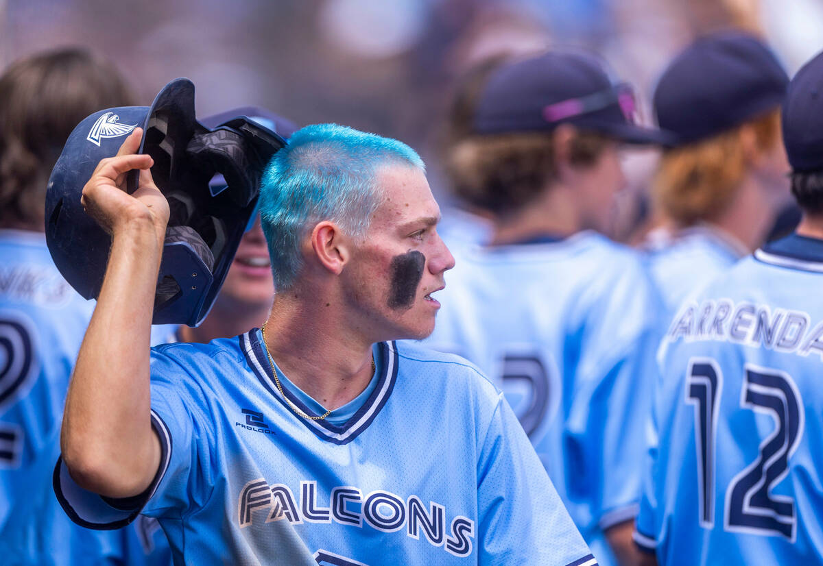 Foothill batter Landon Angelo shows off his dyed hair following a go-ahead run against Shadow R ...