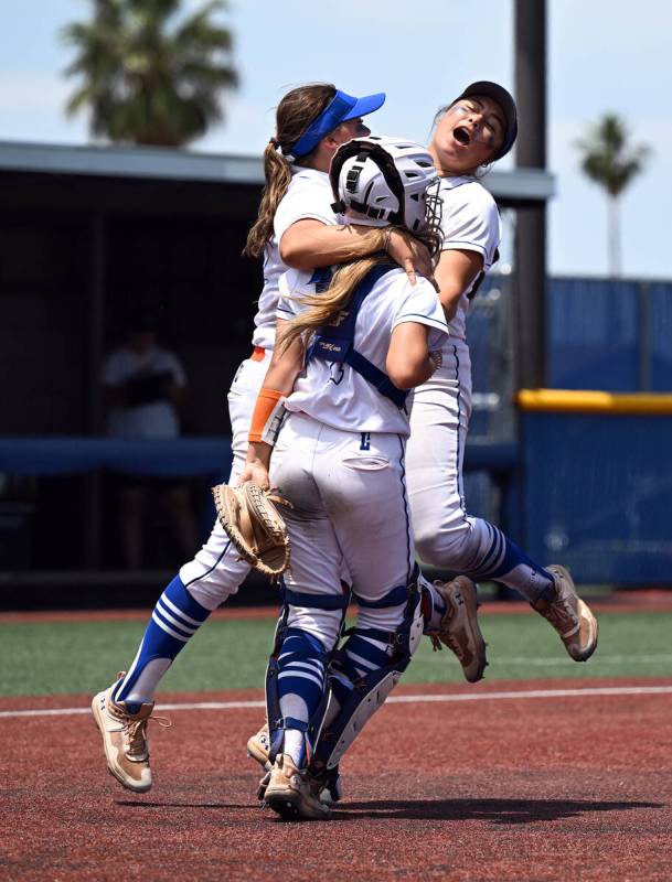 Bishop Gorman’s, from left, Jordyn Fray, Chloe Makinney and Kyla Acres celebrate their v ...