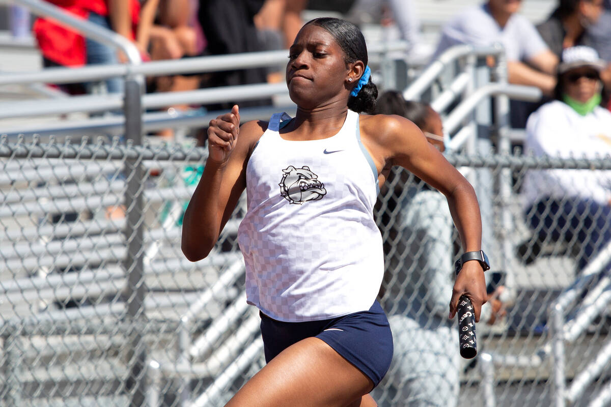 Centennial's Iyonna Codd competes in the girls 4x200 meter relay race during the class 5A South ...