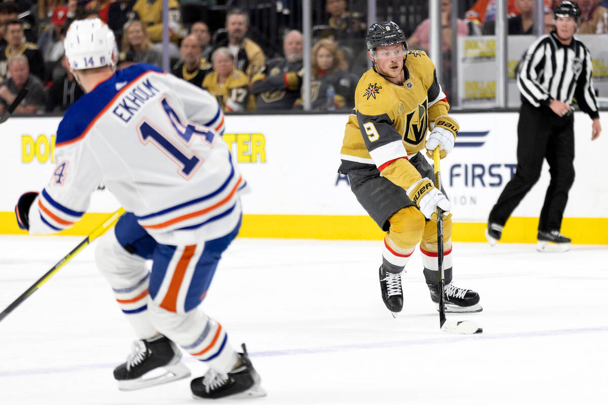 Golden Knights center Jack Eichel (9) skates up the ice against Edmonton Oilers defenseman Matt ...