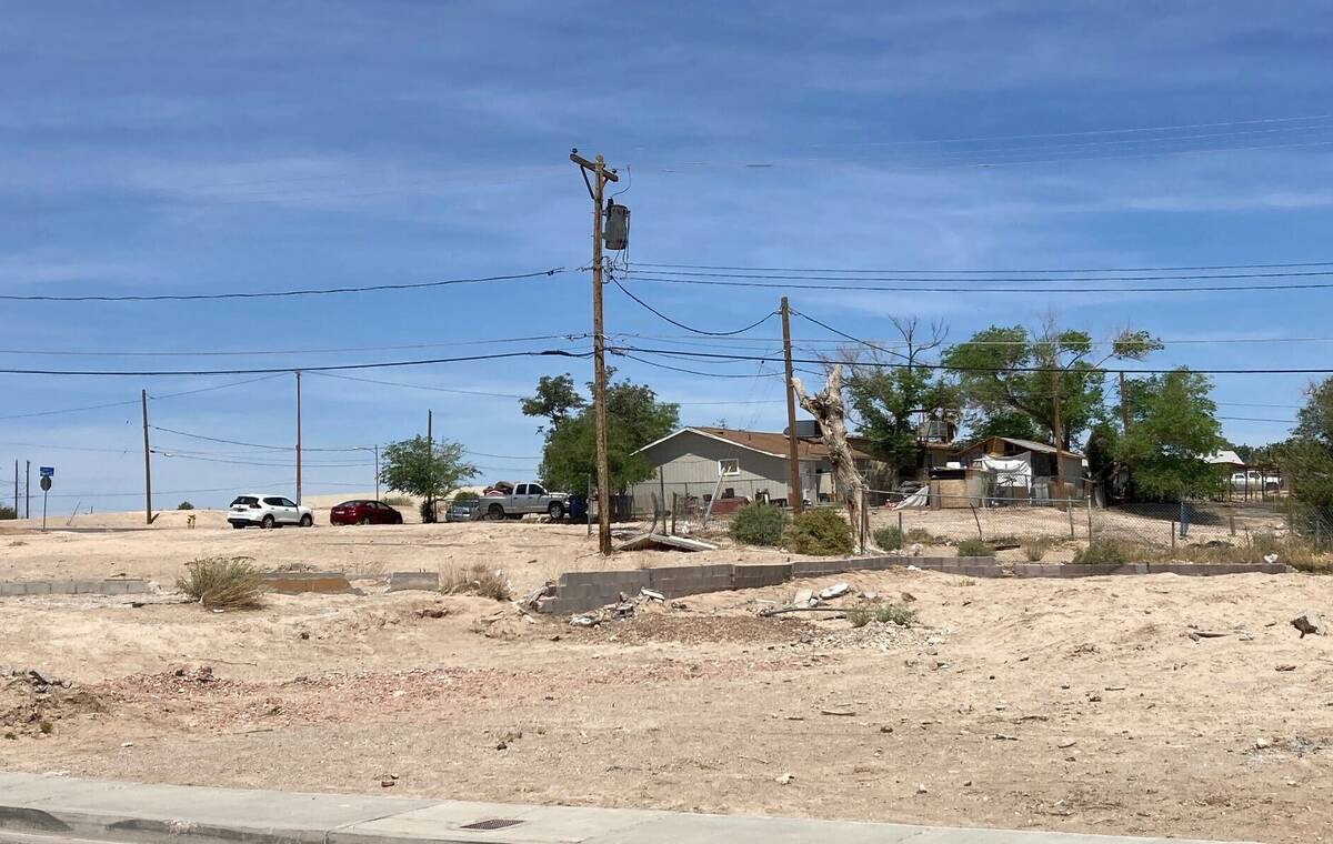 Broken foundations lie where homes once stood in the Windsor Park neighborhood of North Las Veg ...