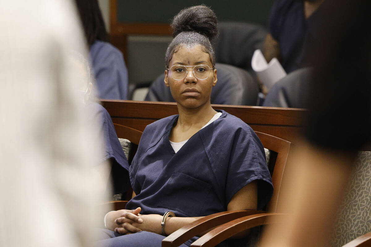 Lakeisha Holloway sits in court before her hearing at the Regional Justice Center, Thursday, Ma ...