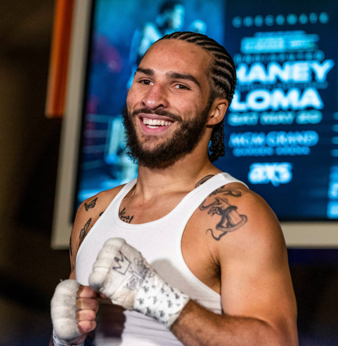 Boxer Nico Ali Walsh pauses for a smile while he shadow boxes during the open undercard fighter ...