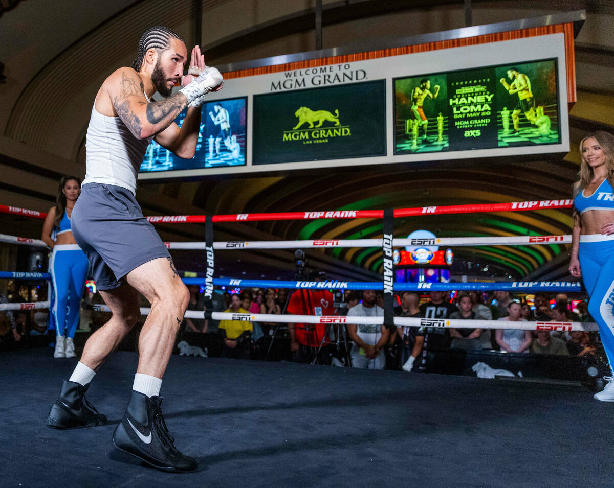 Boxer Nico Ali Walsh shadow boxes during the open undercard fighter workouts at the MGM Grand S ...