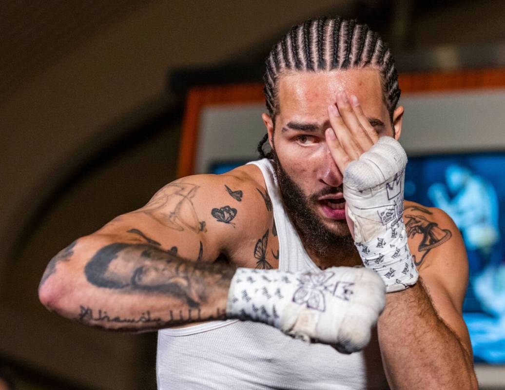 Boxer Nico Ali Walsh shadow boxes during the open undercard fighter workouts at the MGM Grand S ...