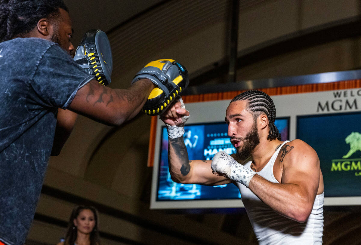Boxer Nico Ali Walsh hits the pads during the open undercard fighter workouts at the MGM Grand ...