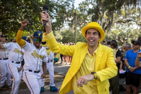 Savannah Bananas owner Jesse Cole emcees a pregame parade and performance for the fans before t ...