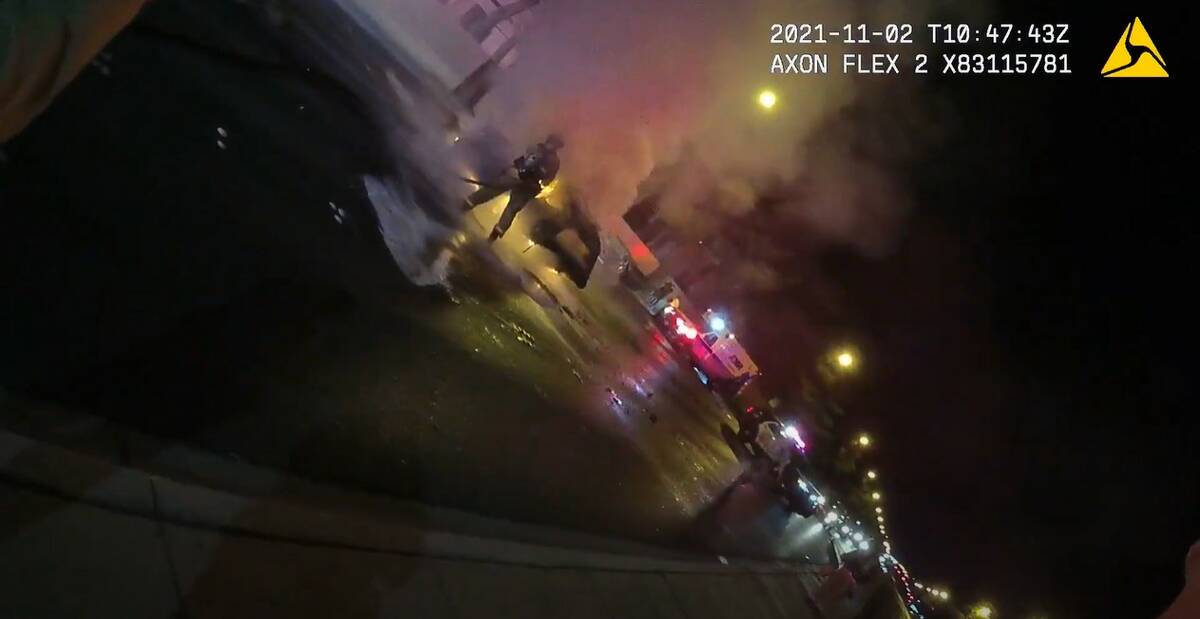 A screenshot from a Las Vegas Metropolitan Police Department body camera shows the scene of a d ...