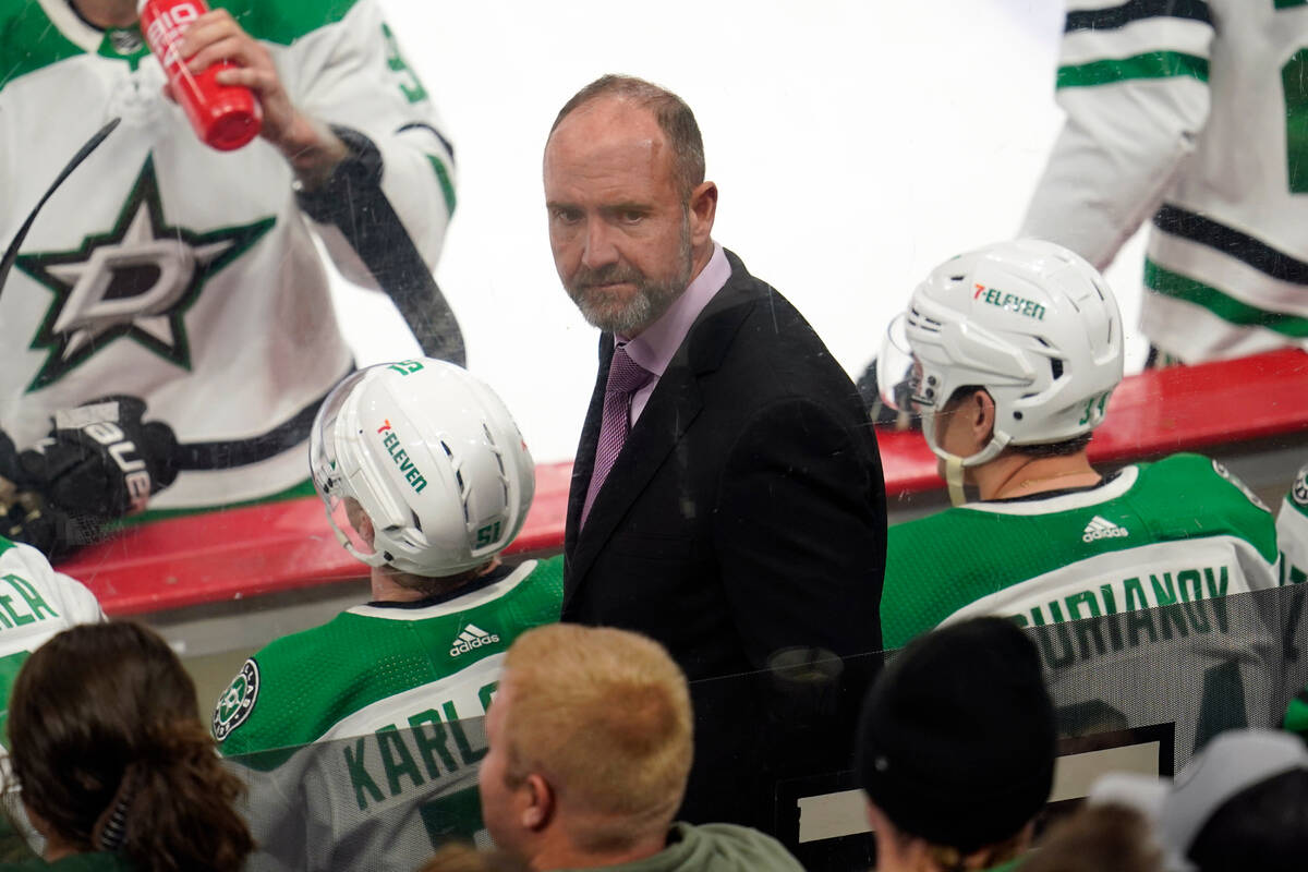 FILE - Dallas Stars coach Pete DeBoer looks back during the first period of the team's NHL hock ...