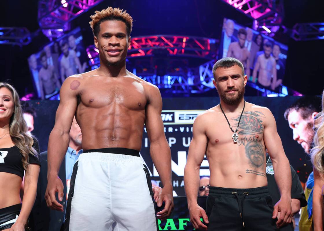 Devin Haney (left) and Vasiliy Lomachenko (right) pose during the weigh in prior to their May 2 ...