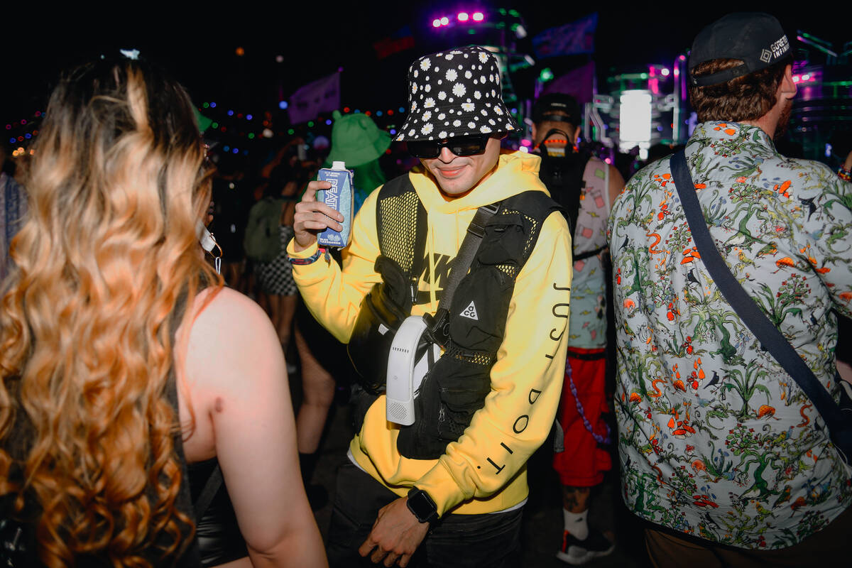 Festival goers dance to music at the bassPOD stage during the first day of Electric Daisy Carni ...