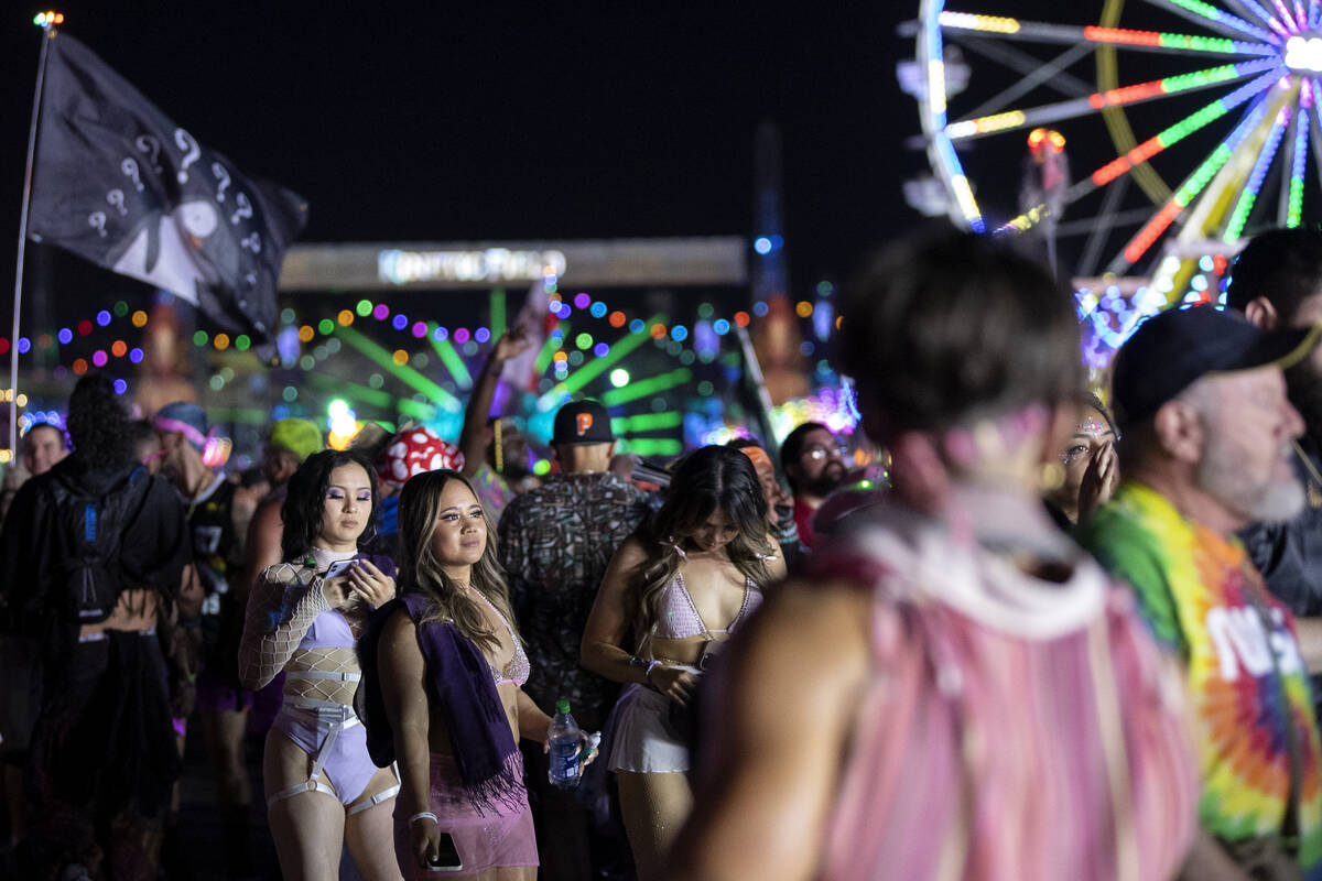 Crowds move through festival grounds during the second day of Electric Daisy Carnival on Saturd ...