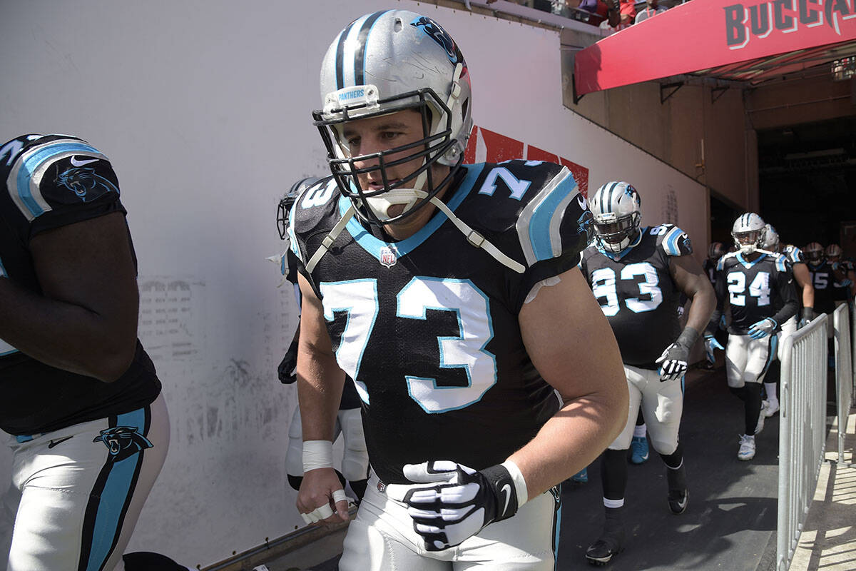 Carolina Panthers offensive guard Greg Van Roten (73) jogs out of the tunnel and onto the field ...