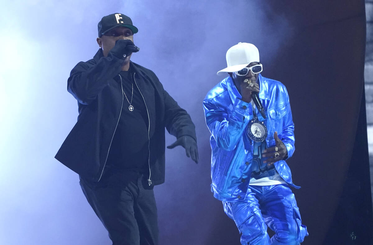 Chuck D, left, and Flavor Flav perform "Rebel Without a Pause" at the 65th annual Gra ...