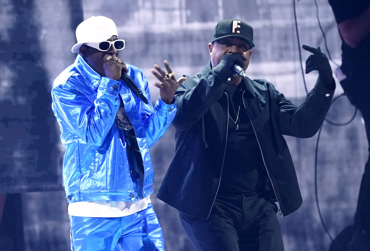 Flavor Flav, left, and Chuck D. perform "Rebel Without a Pause" at the 65th annual Gr ...