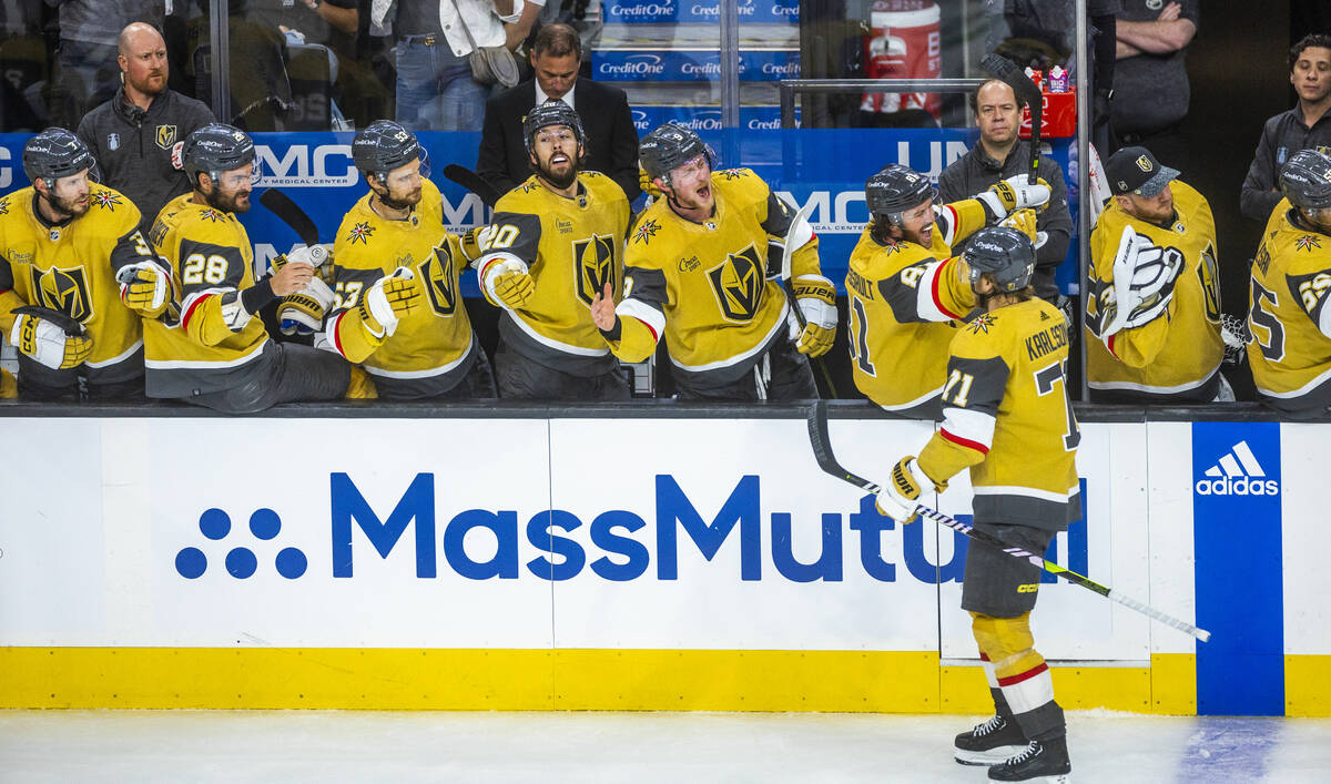 Teammates congratulate Golden Knights center William Karlsson (71) after a score against Dallas ...