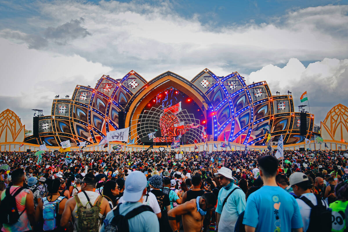 Attendees relax by the Tokyo Karaoke Bar during the second day of the  Electric Daisy Carnival a …