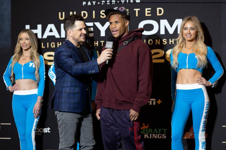 Devin Haney speaks with emcee Mark Shunock after arriving to MGM Grand ahead of his Saturday ni ...